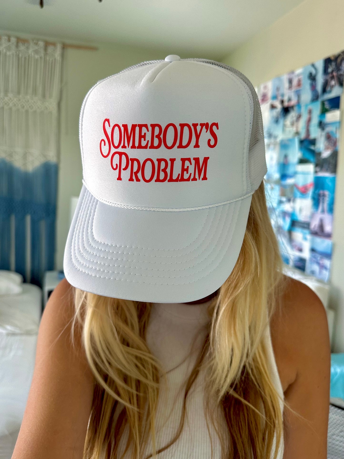 somebody’s problem trucker hat